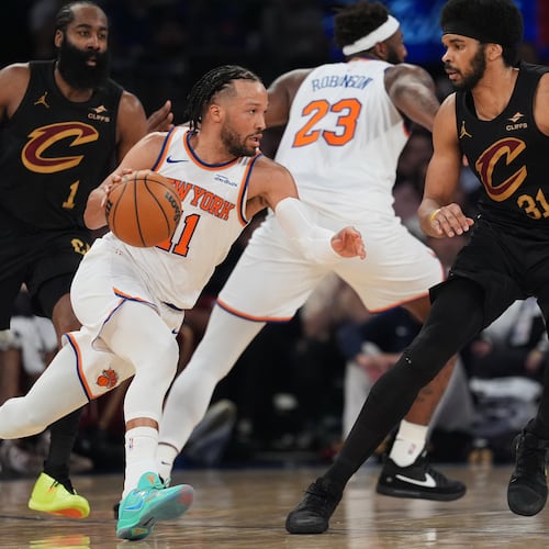 New York Knicks' Jalen Brunson (11) moves around the Cleveland Cavaliers defense during the first half of Game 1 in the Eastern Conference finals NBA basketball playoffs series Tuesday, May 19, 2026, in New York. (AP Photo/Seth Wenig)