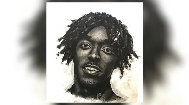 Sandy Springs police are looking for a man accused of robbing and stomping on a woman's face. (Credit: Sandy Springs Police Department)