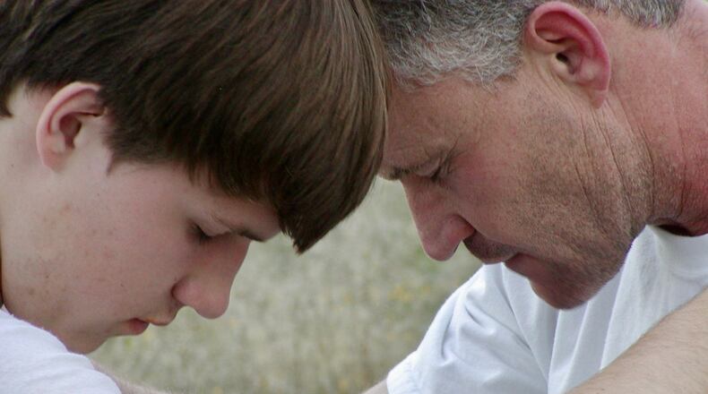 A scene from the new Daniel Karslake documentary about evangelical Christians and the LGBT community, “For They Know Not What They Do.” The film kicks off the 32nd annual “Out On Film” festival in Atlanta. Pictured are Ryan Robertson (left) and his father Rob Robertson.