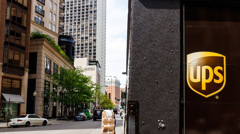 A UPS delivery truck in May 2018 in Chicago. UPS continued riding a wave of skyrocketing shipping demand from online shopping and vaccine deliveries in the first quarter of the year, with both profit and revenue soaring. (Jonathan Weiss/Dreamstime/TNS)