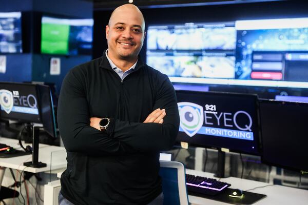 CEO of EyeQ Monitoring Markus Scott says AI reduces the need for security guards at multiple locations or constant patrols. EyeQ Monitoring is a security operations center where workers monitor alerts from clients' cameras to respond and contact police if needed. The security cameras use AI to detect threats. (Abbey Cutrer/AJC)