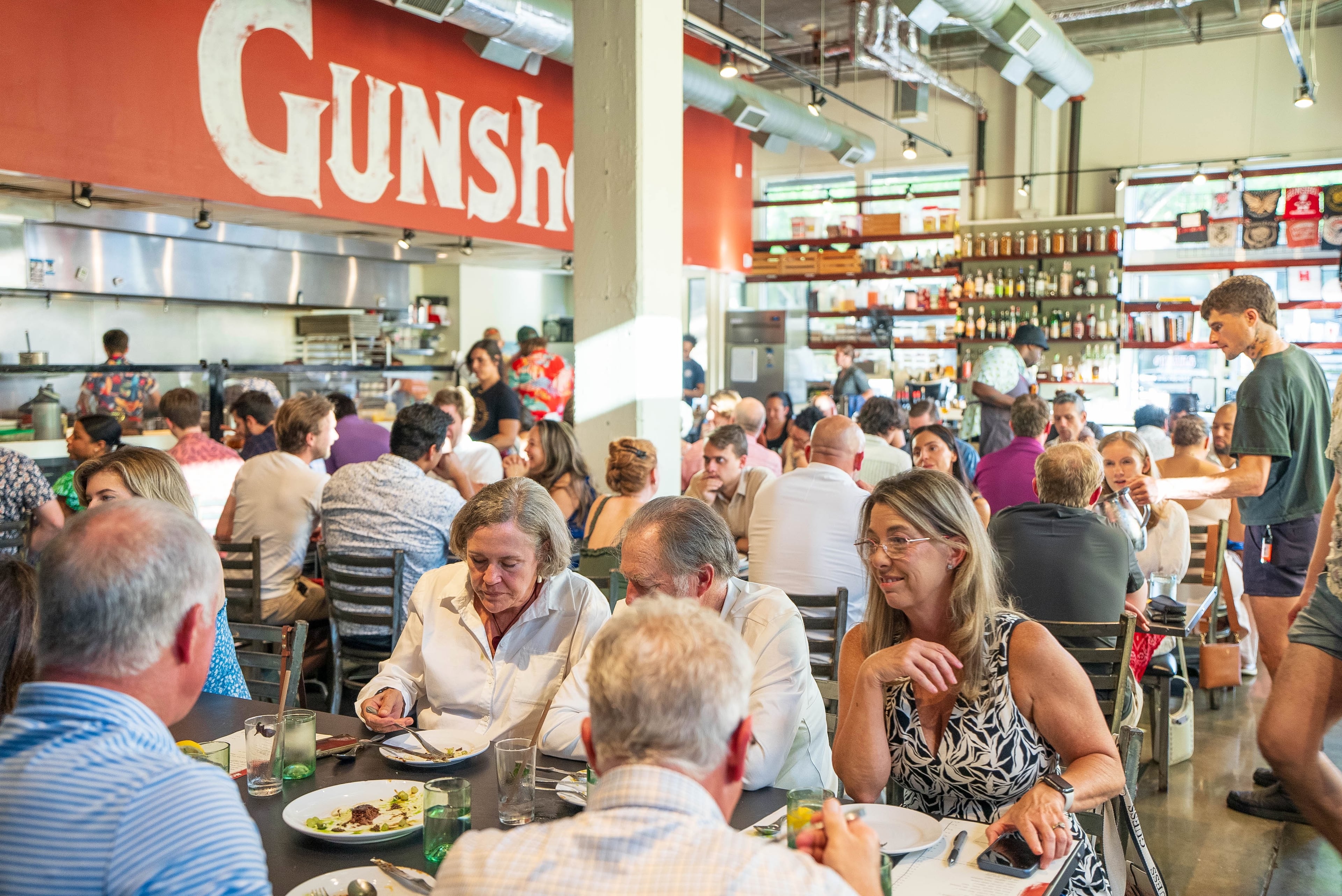 Communal seating makes for an even more interactive dining experience at Gunshow. (Courtesy of Blake Studwell)