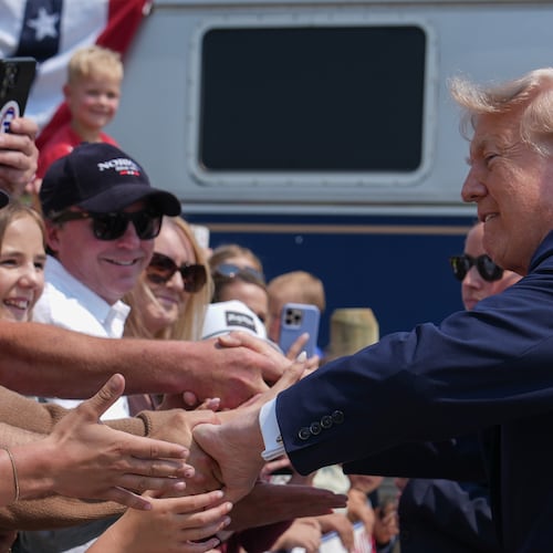 President Donald Trump greets supporters after arriving on a Freedom 250 train, Wednesday, July 1, 2026, in Medora, N.D. (AP Photo/Julia Demaree Nikhinson)