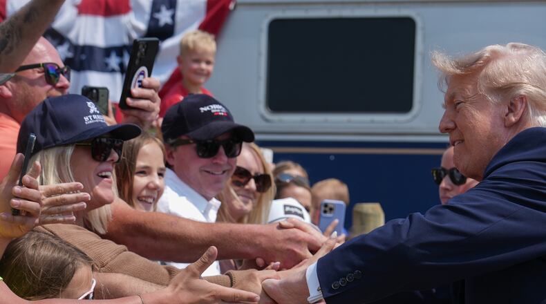 President Donald Trump greets supporters after arriving on a Freedom 250 train, Wednesday, July 1, 2026, in Medora, N.D. (AP Photo/Julia Demaree Nikhinson)
