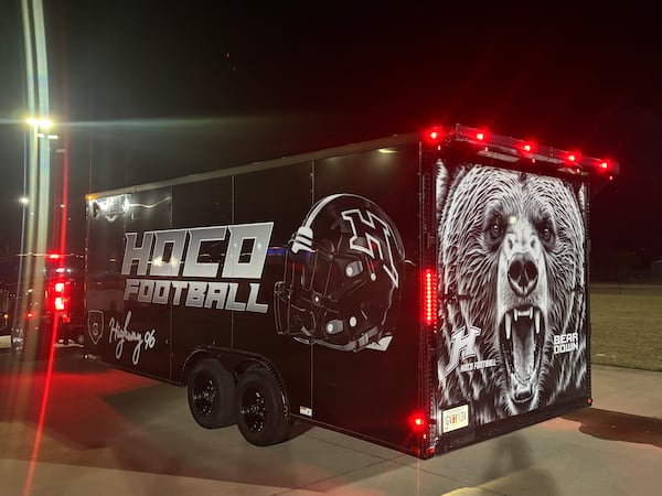 Houston County’s new equipment trailer is coach Jeremy Edwards’ newest way to grow his program's brand across the state. The journey to Thomas County will be its first trip. (Jack Leo/AJC)
