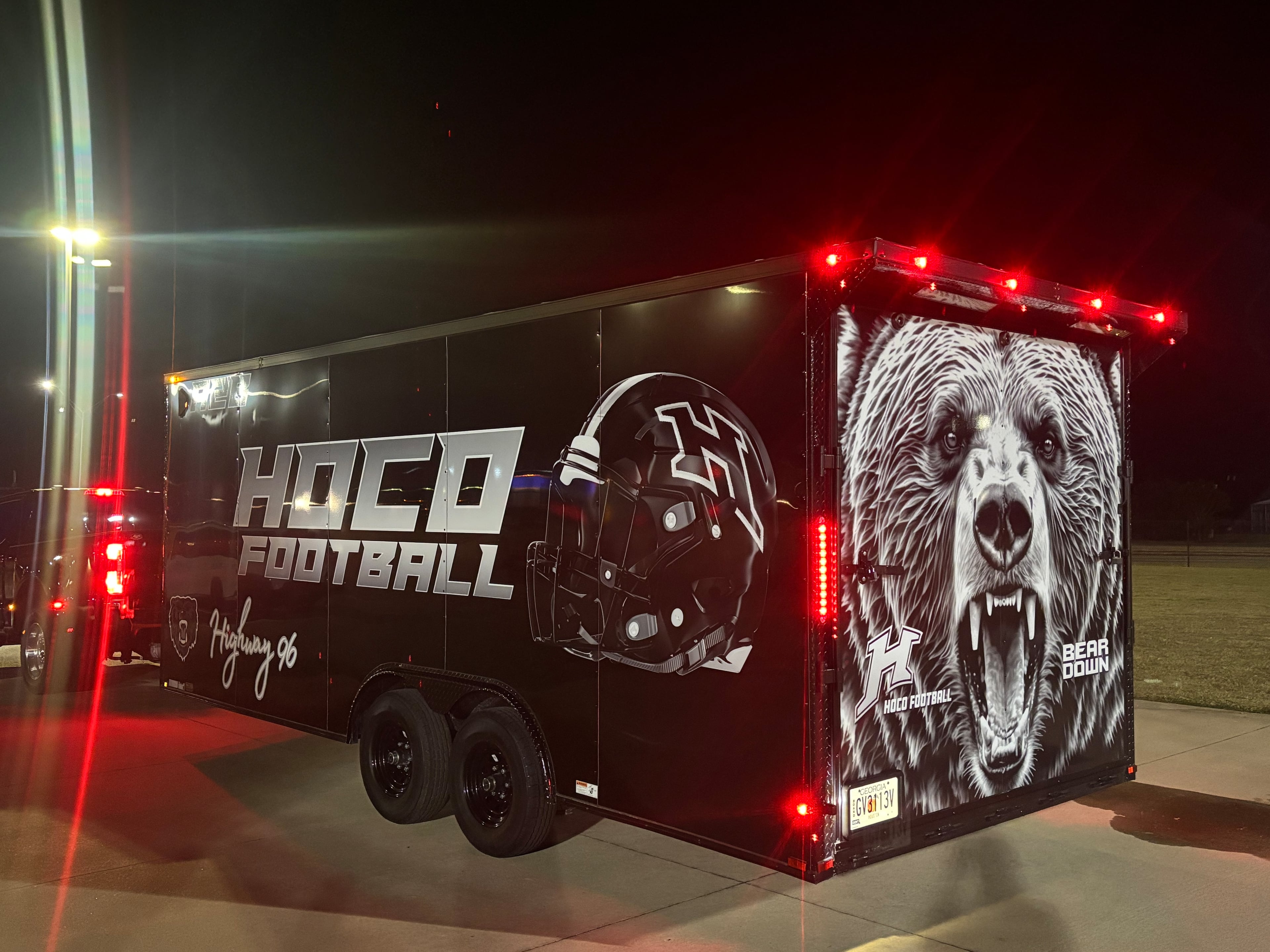 Houston County’s new equipment trailer is coach Jeremy Edwards’ newest way to grow his program's brand across the state. The journey to Thomas County will be its first trip. (Jack Leo/AJC)