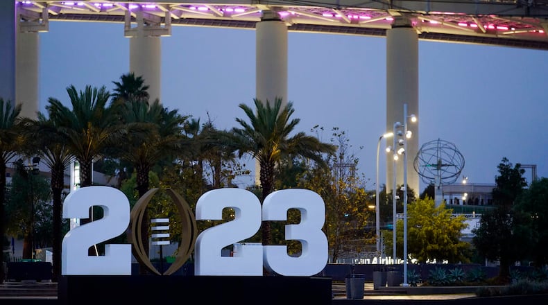 SoFi Stadium is decorated with the CFP logo ahead of the CFP national championship game, Wednesday, Jan. 4, 2023, in Inglewood, Calif. Georgia faces TCU Monday for the title. (AP Photo/Marcio Jose Sanchez)