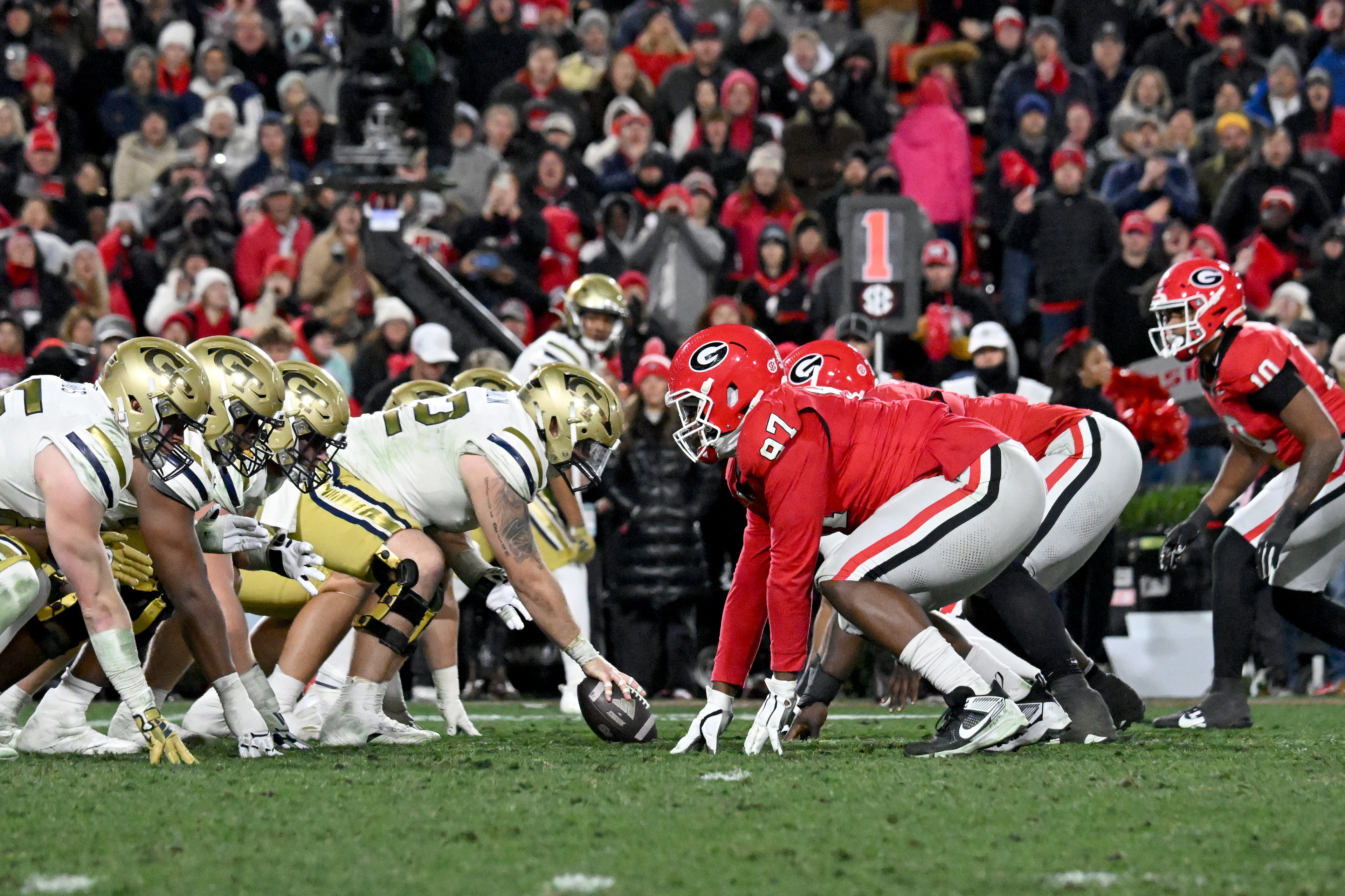 Georgia and Georgia Tech line up at the line of scrimmage during the second half in an NCAA football game at Sanford Stadium, Nov. 29, 2024, in Athens. (Hyosub Shin/AJC)