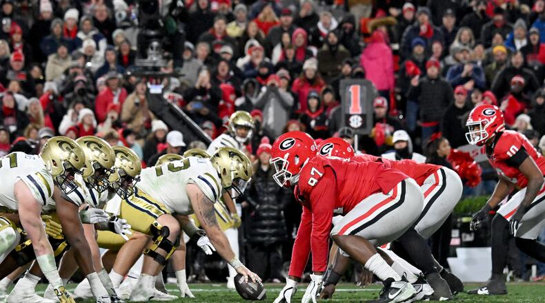 Georgia and Georgia Tech line up at the line of scrimmage  during the second half in an NCAA football game at Sanford Stadium, Friday, November 29, 2024, in Athens. Georgia won 44-42 in eight overtimes. (Hyosub Shin / AJC)