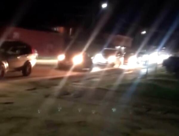 This image taken from video provided by Viral Tonganz shows vehicles in traffic after a strong 7.1 magnitude earthquake hit near Tonga, prompting an initial tsunami warning that was later lifted for the Pacific island country. (Viral Tonganz via AP)
