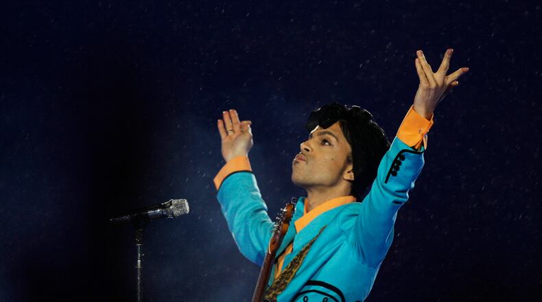 Prince performs during the halftime show at Super Bowl XLI at Dolphin Stadium in Miami. (AP Photo/Alex Brandon, File)