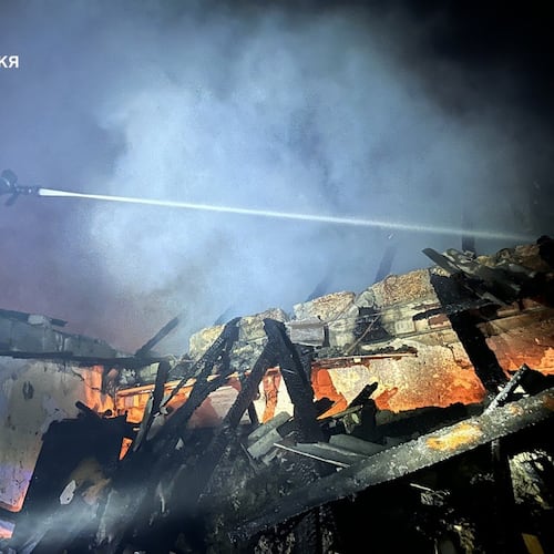 In this photo, provided by the Ukrainian Emergency Service, firefighters extinguish a fire in a residential building following a Russian drone attack in Zaporizhzhia, Ukraine, Friday, June 26, 2026. (Ukrainian Emergency Service via AP)