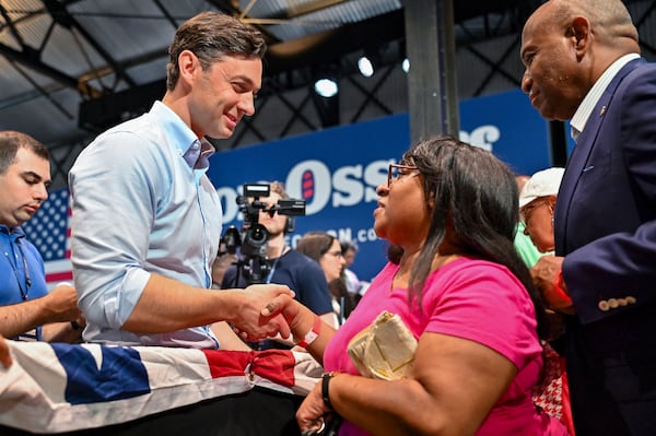 U.S. Sen. Jon Ossoff greets a constituent at a rally in Savannah last month. (Sarah Peacock for the AJC)