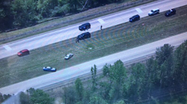 Two people were shot Friday while riding on Ga. 365 in Hall County.