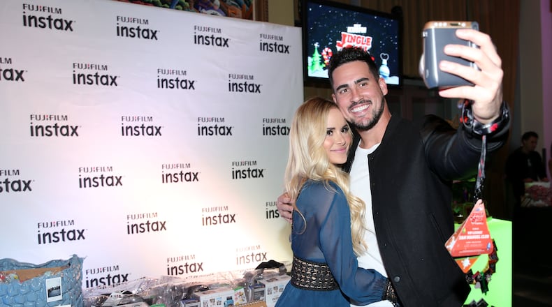 LOS ANGELES, CA - DECEMBER 02: TV personalities Amanda Stanton and Josh Murray attend the 102.7 KIIS FM Artist Gift Lounge presented by FUJIFILM INSTAX at iHeartRadio's Jingle Ball 2016 presented by Capital One at Staples Center on December 2, 2016 in Los Angeles, California. (Photo by Phillip Faraone/Getty Images for iHeartMedia)