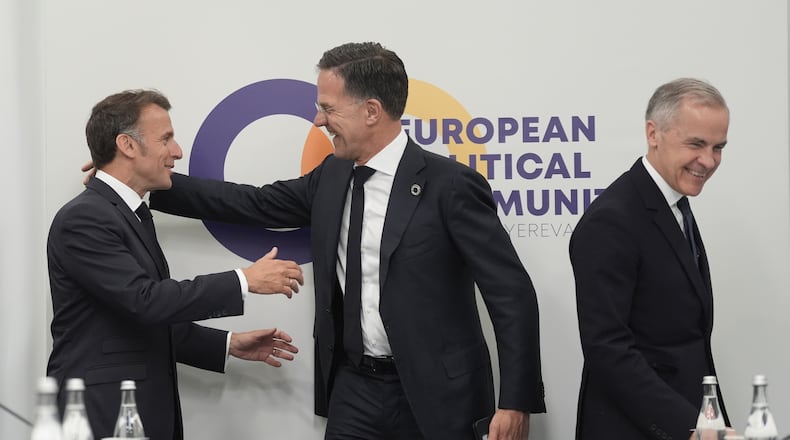 France's President Emmanuel Macron, from left, NATO Secretary General Mark Rutte and Canada's Prime Minister Mark Carney attend the European Political Community summit in Yerevan, Armenia, Monday May 4, 2026. (Stefan Rousseau/Pool Photo via AP)