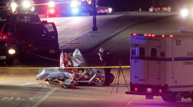 Two people have been killed after two airplanes collided in midair near McKinney, Texas, Saturday, Dec. 31, 2016. The Federal Aviation Administration says the collision occurred shortly after 5:30 p.m. near Aero Country Airport. The private airport is about 35 miles north of downtown Dallas. (Vernon Bryant/The Dallas Morning News via AP)