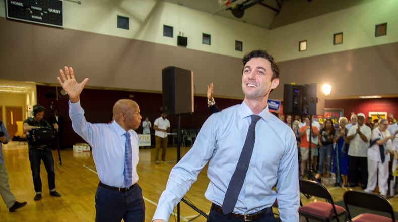 Democratic Senate candidate Jon Ossoff and Rep. John Lewis wave to the crowd at the start of a voter registration rally at the MLK Recreation Center on Saturday, September 28, 2019. STEVE SCHAEFER / SPECIAL TO THE AJC
