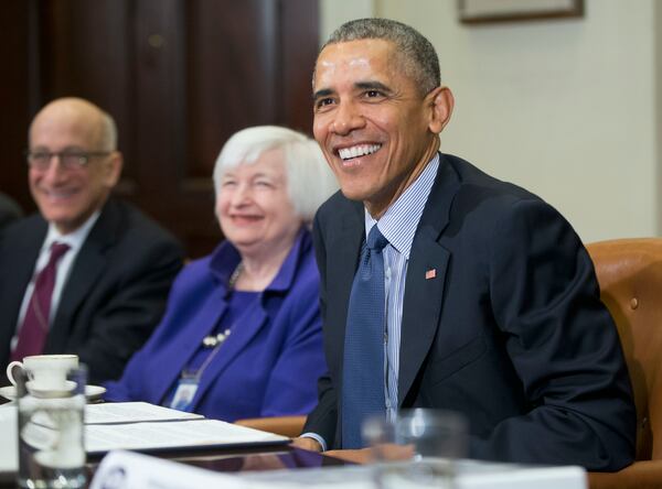 President Barack Obama smiles during his meeting with financial regulators in the Roosevelt Room of the White House in Washington, Monday, March 7, 2016. With Obama are; Commodity Futures Trading Commission (CFTC), Chairman Tim Massad, and Federal Reserve Board Chair Janet Yellen. (AP Photo/Pablo Martinez Monsivais)
