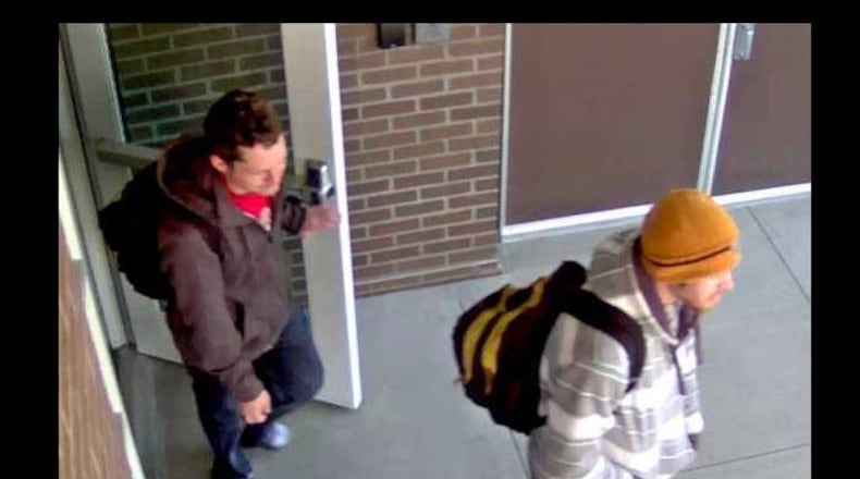 Alpharetta police are searching for these two suspects for the theft of books from Gwinnett Tech.