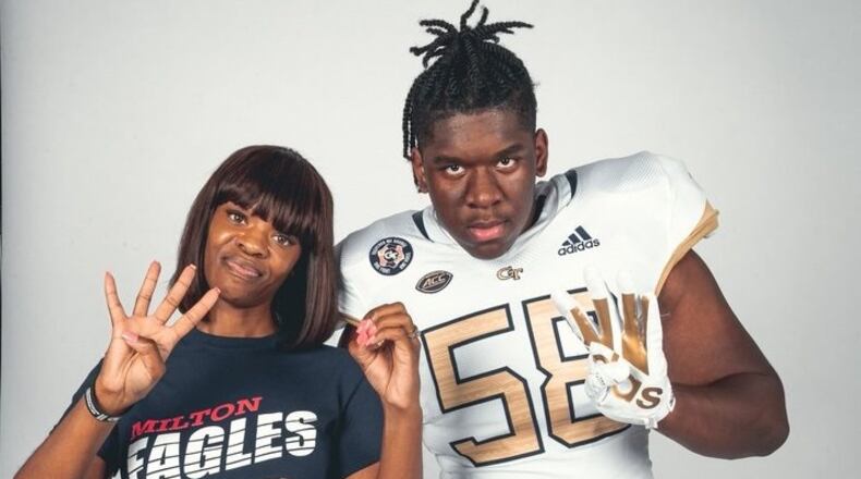 Milton High offensive lineman Brandon Best with his mother, Sharee, during a visit to Georgia Tech. After receiving a scholarship offer June 1, 2021, following an in-person on-campus workout, Best announced his commitment to Tech on June 21. (Photo courtesy of Brandon Best)