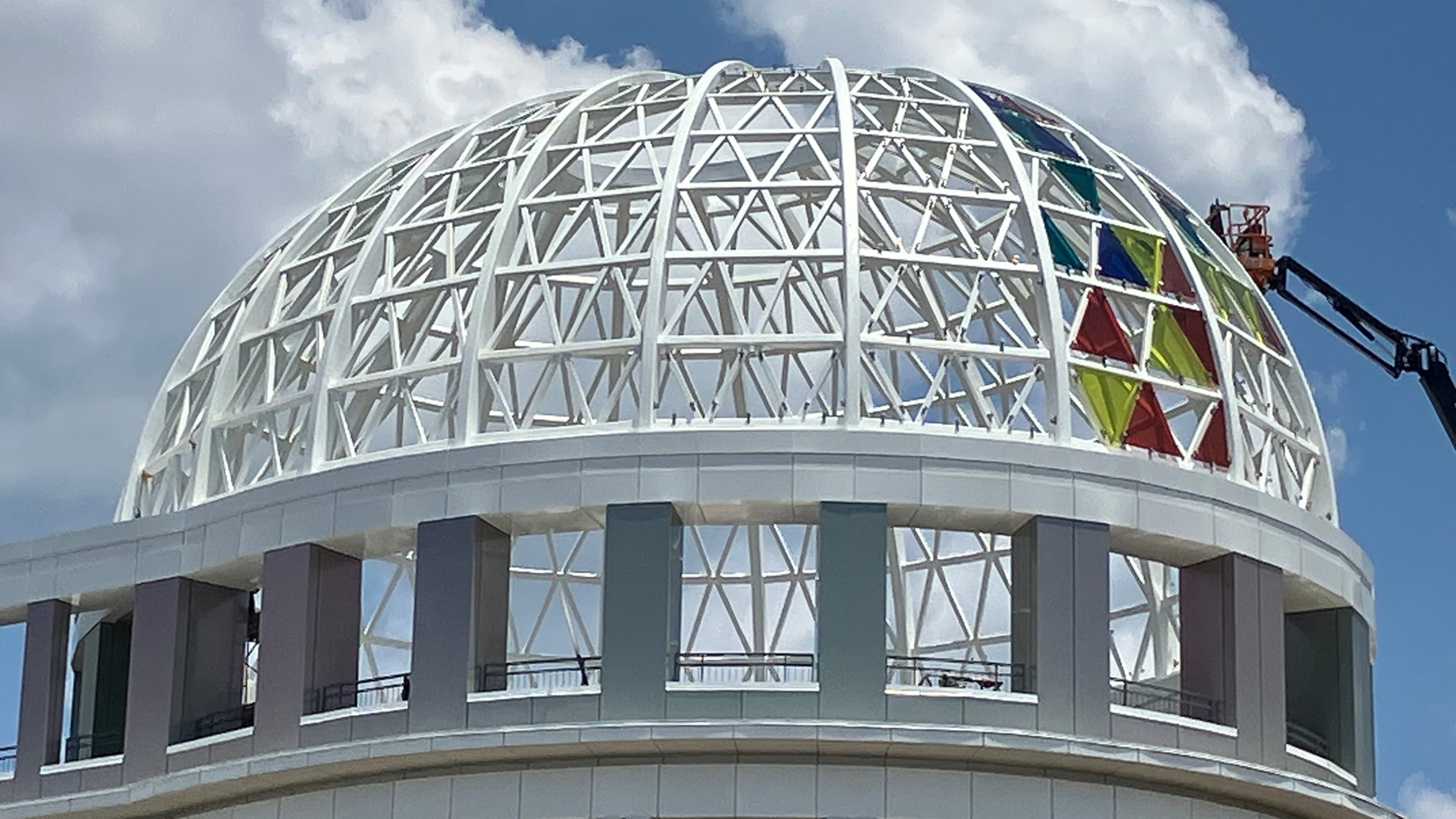 The city of Brookhaven's mayor and City Council last week decided to remove the colored panes of glass from the dome of Brookhaven's new City Centre after residents objected to the brightness of the colors, seen here Friday, June 27, 2025. (Reed Williams/AJC)