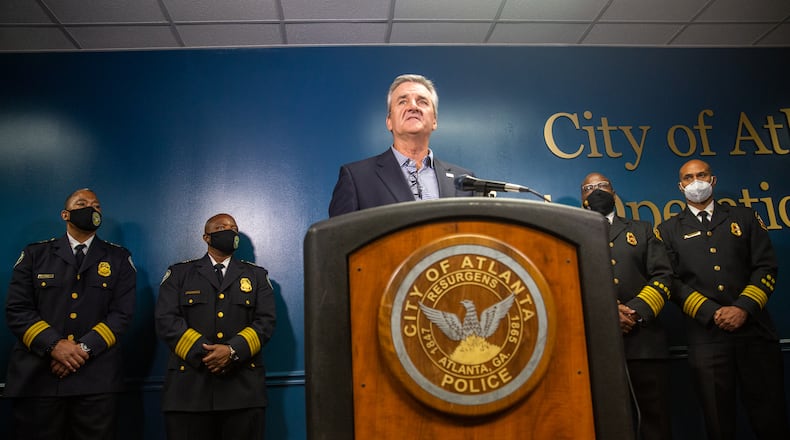 Atlanta Police Foundation President and CEO Dave Wilkinson speaks at a press conference at police headquarters following the Atlanta City Council's approval of a new 85-acre public safety training center. (Jenni Girtman for The Atlanta Journal-Constitution)