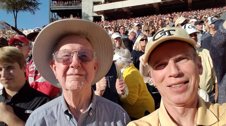 Georgia Tech alumnus Bobby Joe Anderson (left) with his son Stan Anderson (also a Tech graduate) at Tech's 2016 win over Georgia at Sanford Stadium. (Courtesy Stan Anderson)