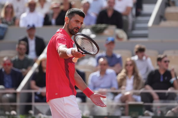 Serbia's Novak Djokovic reacts as he plays against Britain's Cameron Norrie during their fourth round match of the French Tennis Open at the Roland-Garros stadium in Paris, Monday, June 2, 2025. (AP Photo/Thibault Camus)