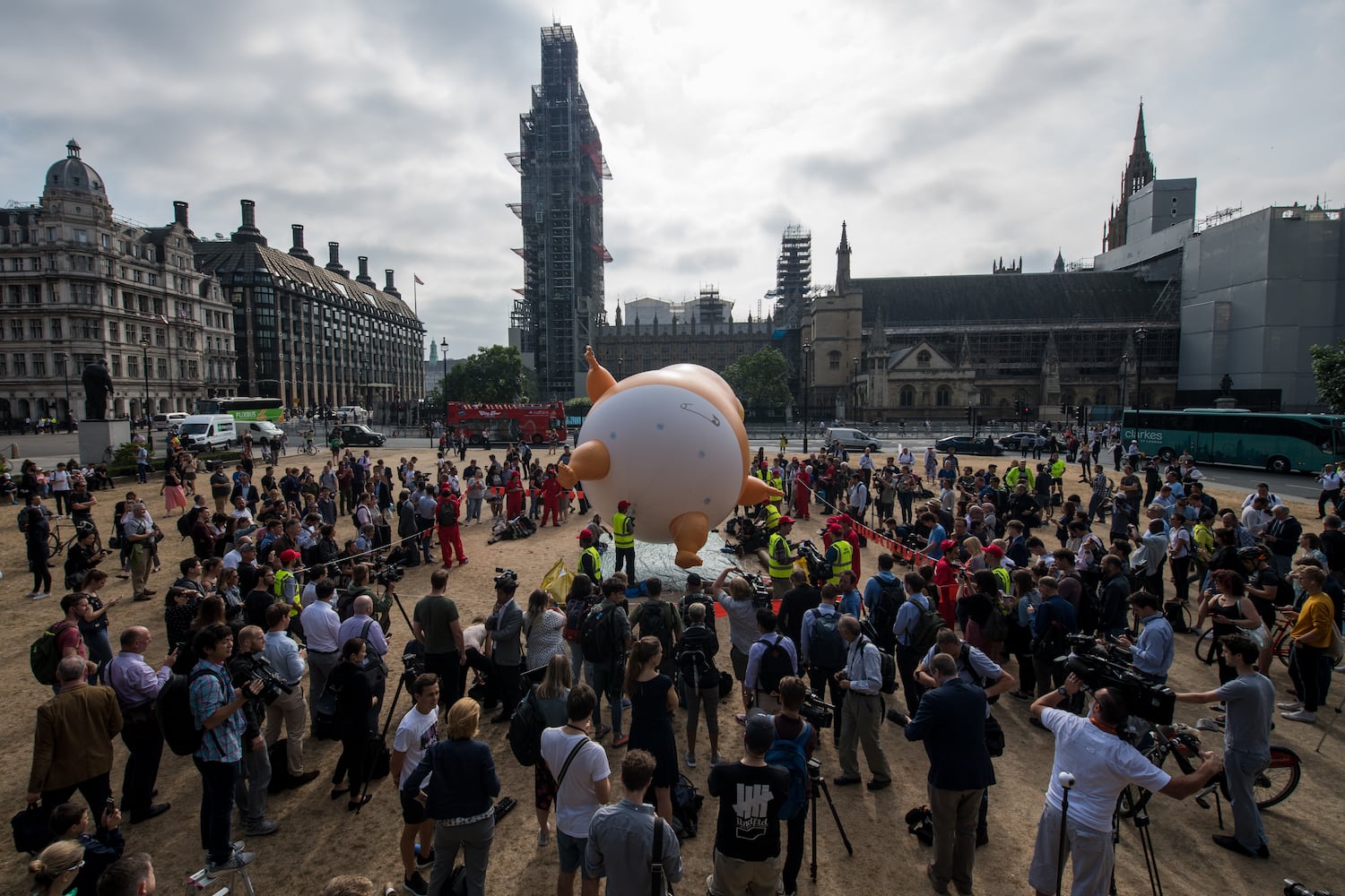 Photos: Baby Trump balloon flies over London protests