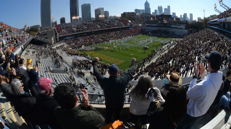 November 15, 2014 Atlanta - Georgia Tech Yellow Jackets fans cheer before their game against the Clemson Tigers at Bobby Dodd Stadium on Saturday, November 15, 2014. HYOSUB SHIN / HSHIN@AJC.COM