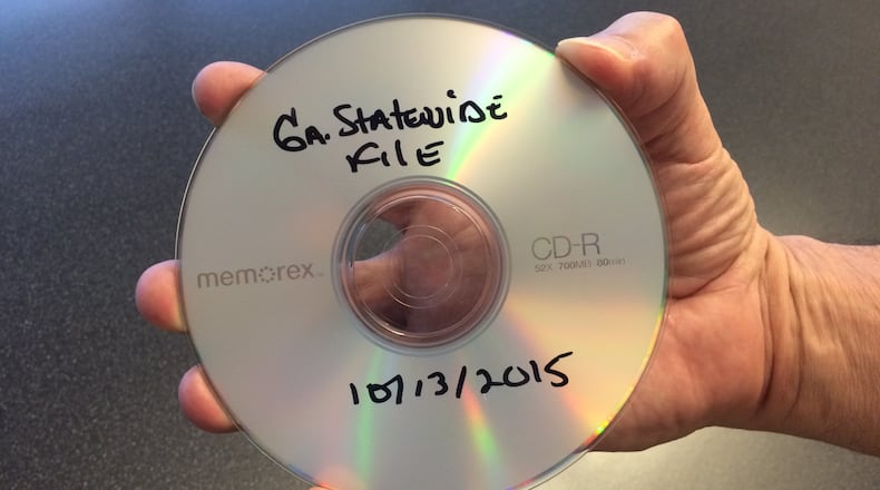 A disc containing voter information that was returned by The Atlanta Journal-Constitution to the Georgia Secretary of State’s Office earlier this month. J. Scott Trubey/Staff strubey@ajc.com