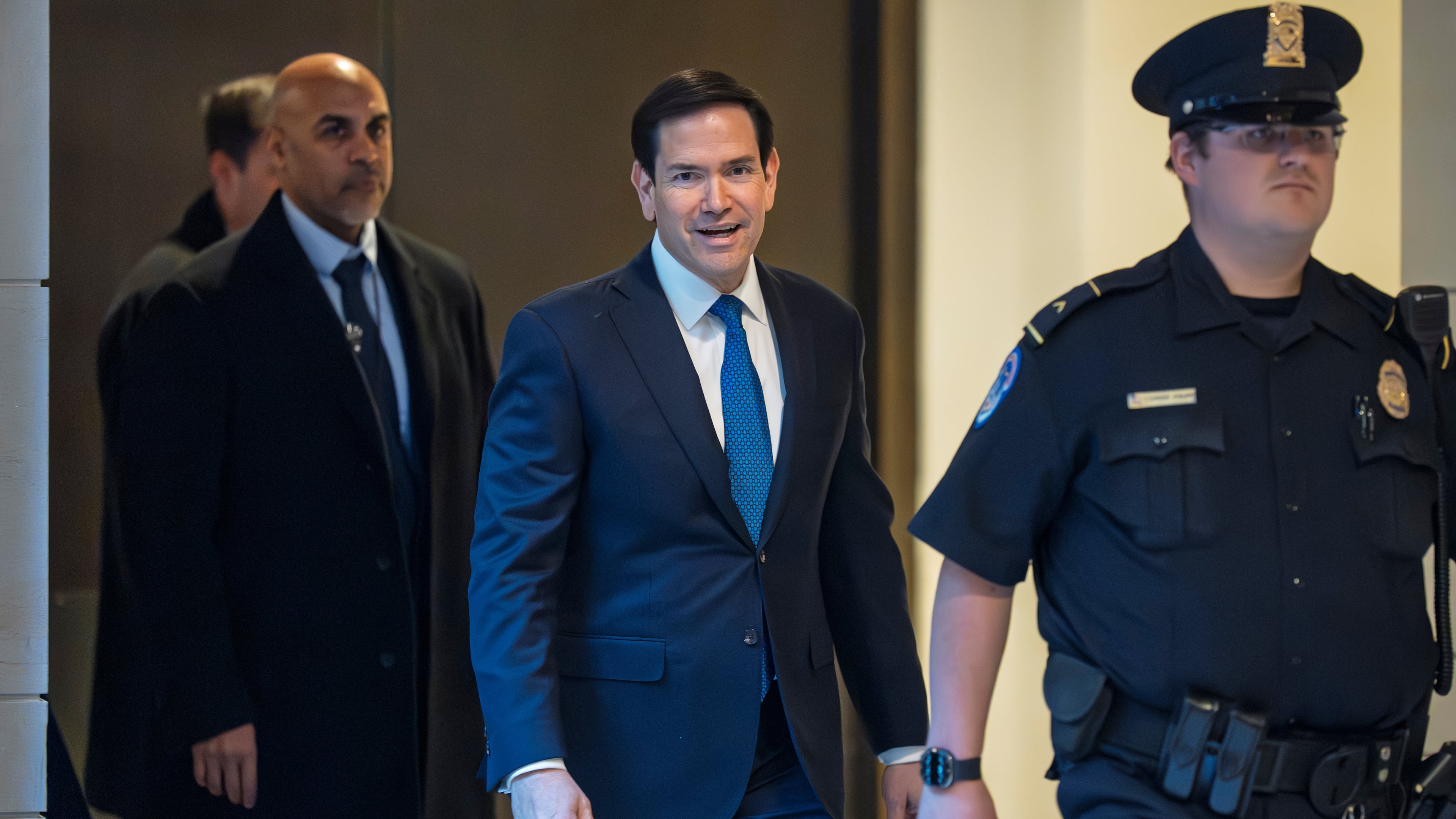 Secretary of State Marco Rubio arrives to join Defense Secretary Pete Hegseth in a secure room in the basement of the Capitol to brief lawmakers on the military strike on a suspected drug smuggling boat and its crew in the Caribbean near Venezuela Sept. 2, at the Capitol in Washington, Tuesday, Dec. 9, 2025. (AP Photo/J. Scott Applewhite)