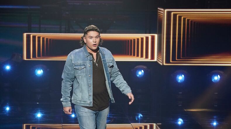 Caleb Kennedy made the top 5 on "American Idol" May 9, 2021 but was cut after a video surfaced online with him seated next to someone with a KKK hood. (ABC/Eric McCandless)