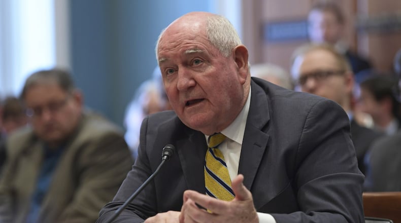 U.S. Agriculture Secretary Sonny Perdue has proposed replacing a share of food stamp payments with boxes of federally picked foods, such as shelf-stable milk, cereal, peanut butter, canned meat, fruits and vegetables. (AP Photo/Susan Walsh)