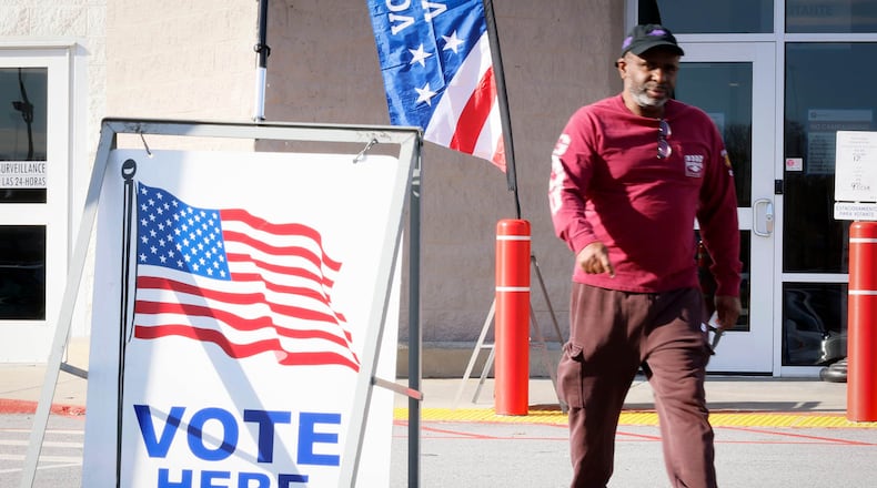 A person is seen leaving the Gwinnett County Voter and Registration Elections on Feb. 19, 2024, the first day of early voting for the Georgia presidential primary. (Miguel Martinez/The Atlanta Journal-Constitution/TNS)