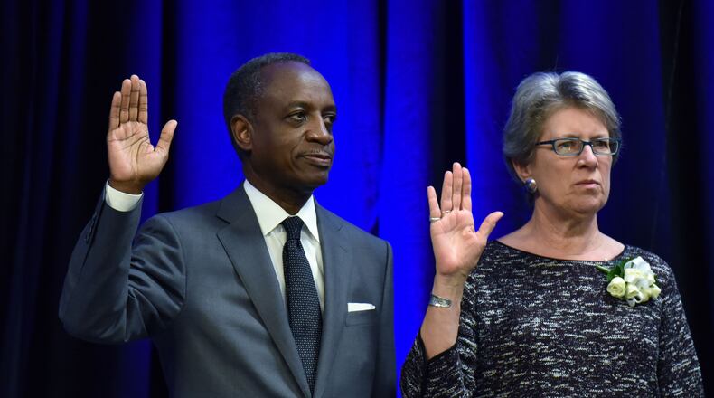 January 13, 2017 Decatur - DeKalb CEO Mike Thurmond (left) and commissioner Kathie Gannon are sworn-in with other county officials during the Honorary Swearing-in Ceremony and Reception at Manuel Maloof Auditorium on Friday, January 13, 2017. HYOSUB SHIN / HSHIN@AJC.COM
