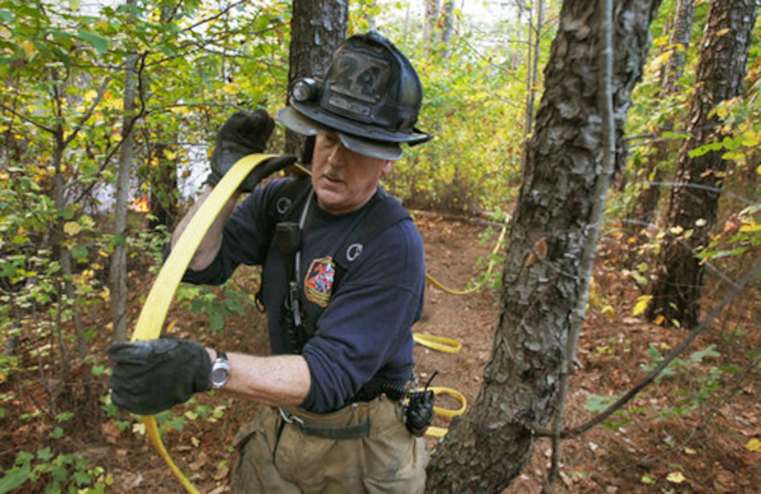 DeKalb firefighters fight brush fire near I-285