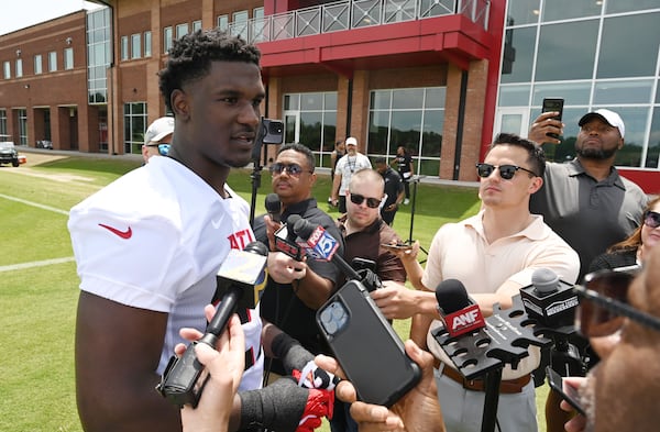 Atlanta Falcons edge rusher James Pearce Jr. (27) speaks to members of the press during the Atlanta Falcons Rookie Minicamp at the Atlanta Falcons Training Camp, Friday, May 9, 2025, in Flowery Branch. (Hyosub Shin / AJC)