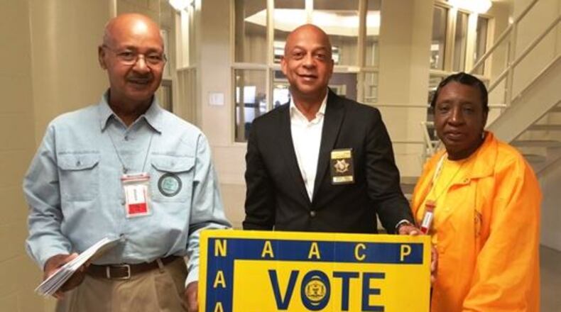 The DeKalb NAACP’s “Voices Beyond Bars” voter registration drive registered 134 inmates at the DeKalb County Jail this week. From left, volunteer George Turner, Sheriff Jeffrey L. Mann and Georgia NAACP Political Action Chair Vivian Moore. (Photo by DeKalb County Sheriff’s Office)