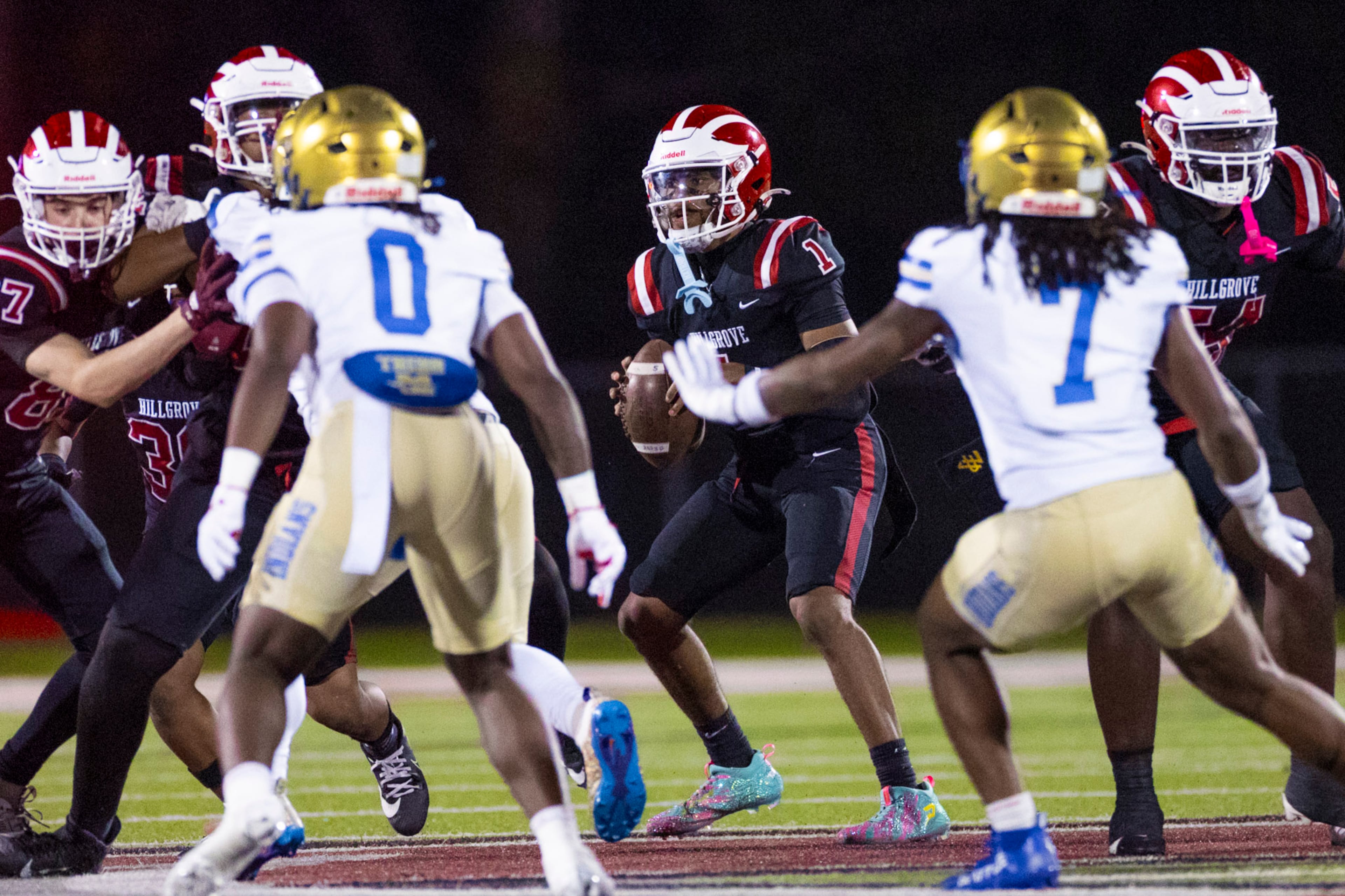 Hillgrove quarter back Donovan Mack (1) prepares to throw against McEachern at Cobb Energy Hillgrove Stadium in Powder Springs, GA on Friday, October 17th, 2025. (Oscar Guevara Saenz for the AJC)