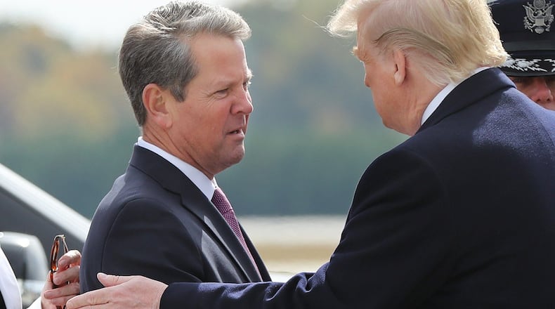 Georgia Gov. Brian Kemp (left) has shown support for President Donald Trump's agenda to downsize the federal government. (Curtis Compton/AJC)