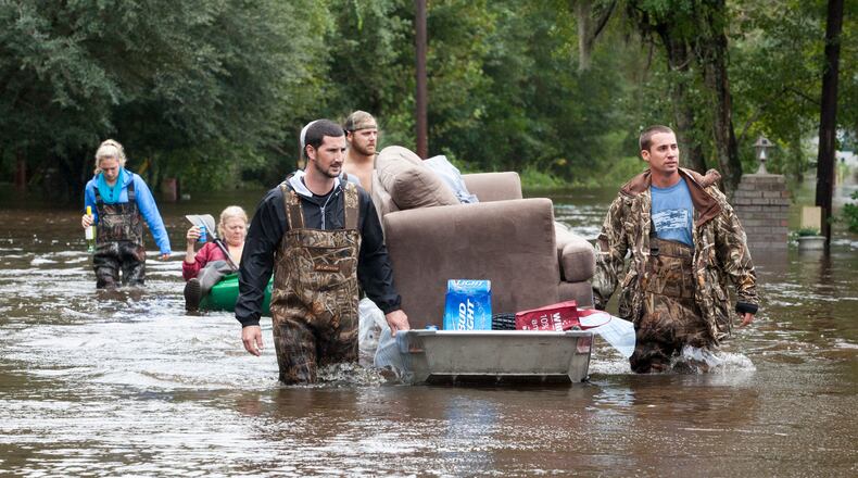 Jason Lee/The Sun News via AP