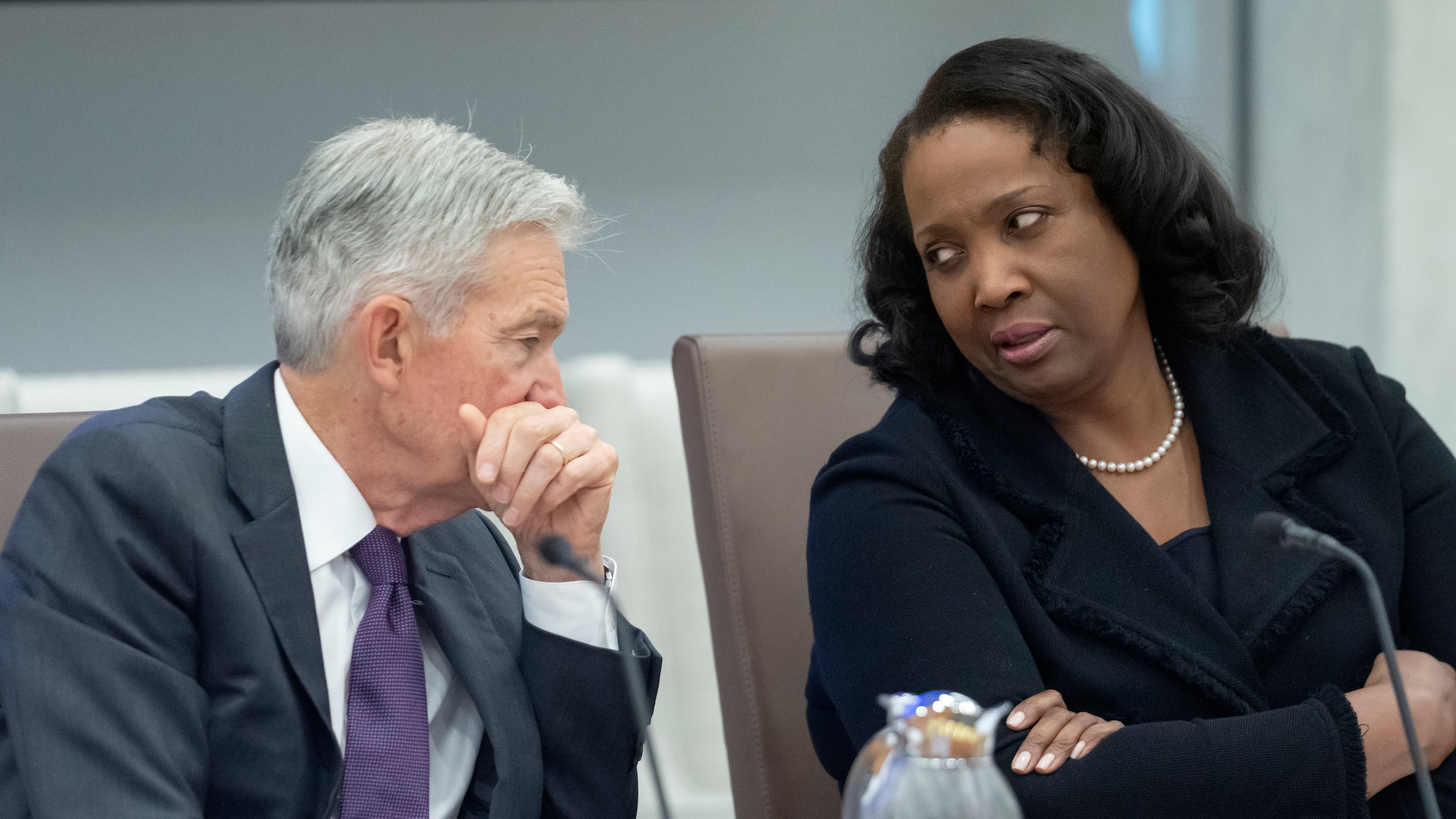 Federal Reserve Chairman Jerome Powell (left) talks with Board of Governors member Lisa Cook during an open meeting of the Board of Governors at the Federal Reserve, June 25, 2025, in Washington. (Mark Schiefelbein/AP)