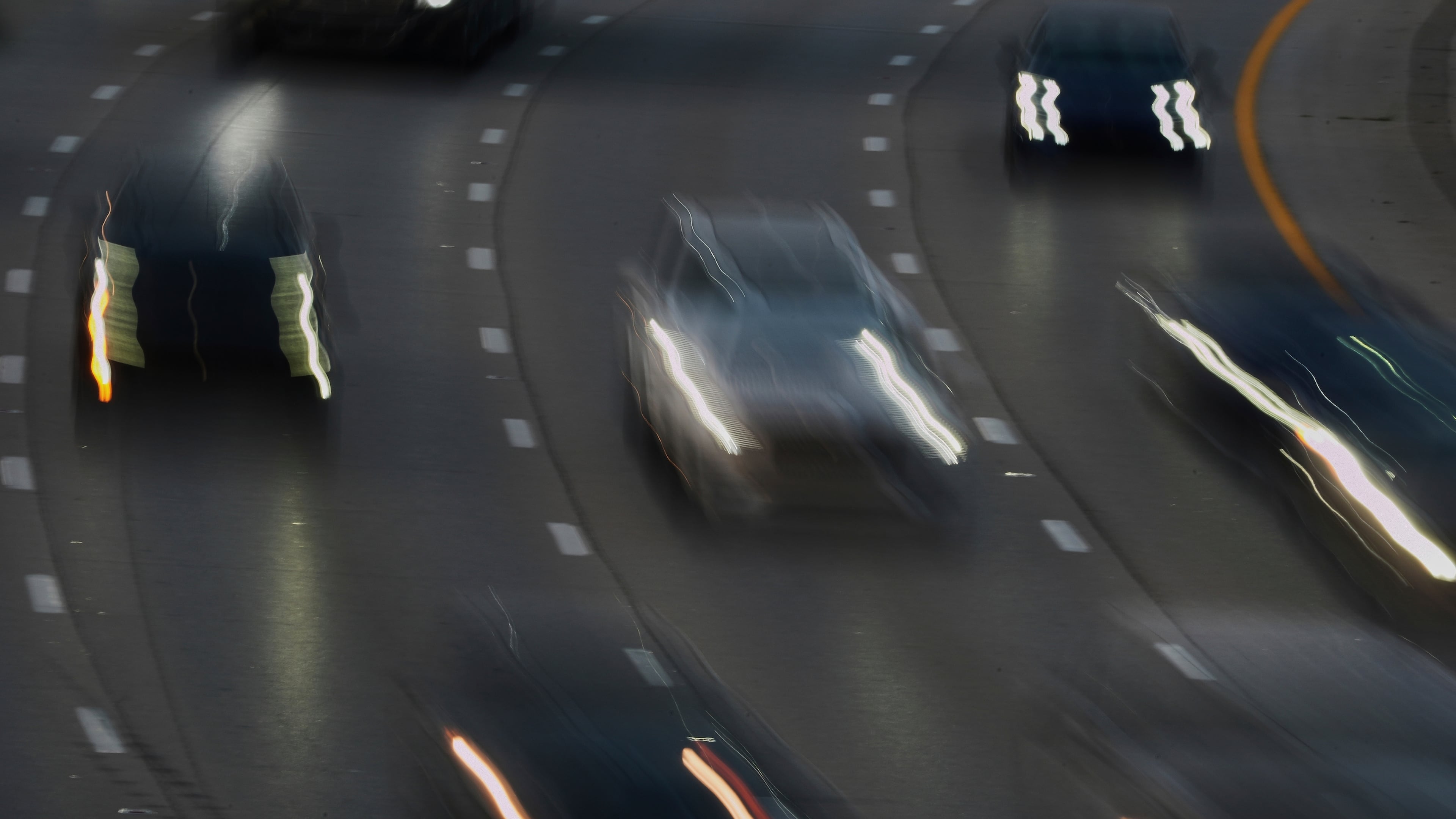 FILE - Vehicles drive along a highway July 30, 2025, in Cincinnati. (AP Photo/Joshua A. Bickel, File)
