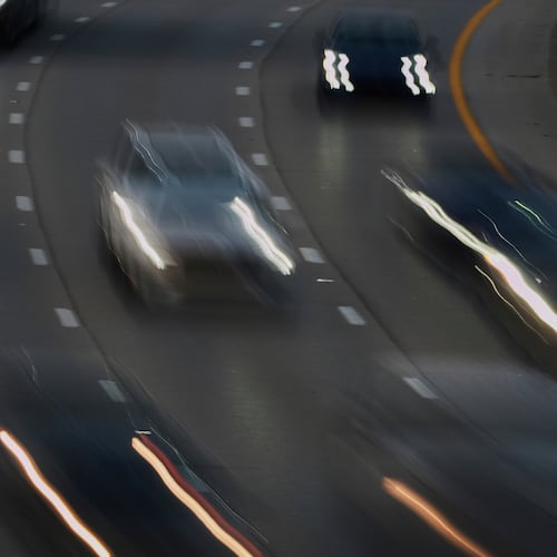 FILE - Vehicles drive along a highway July 30, 2025, in Cincinnati. (AP Photo/Joshua A. Bickel, File)