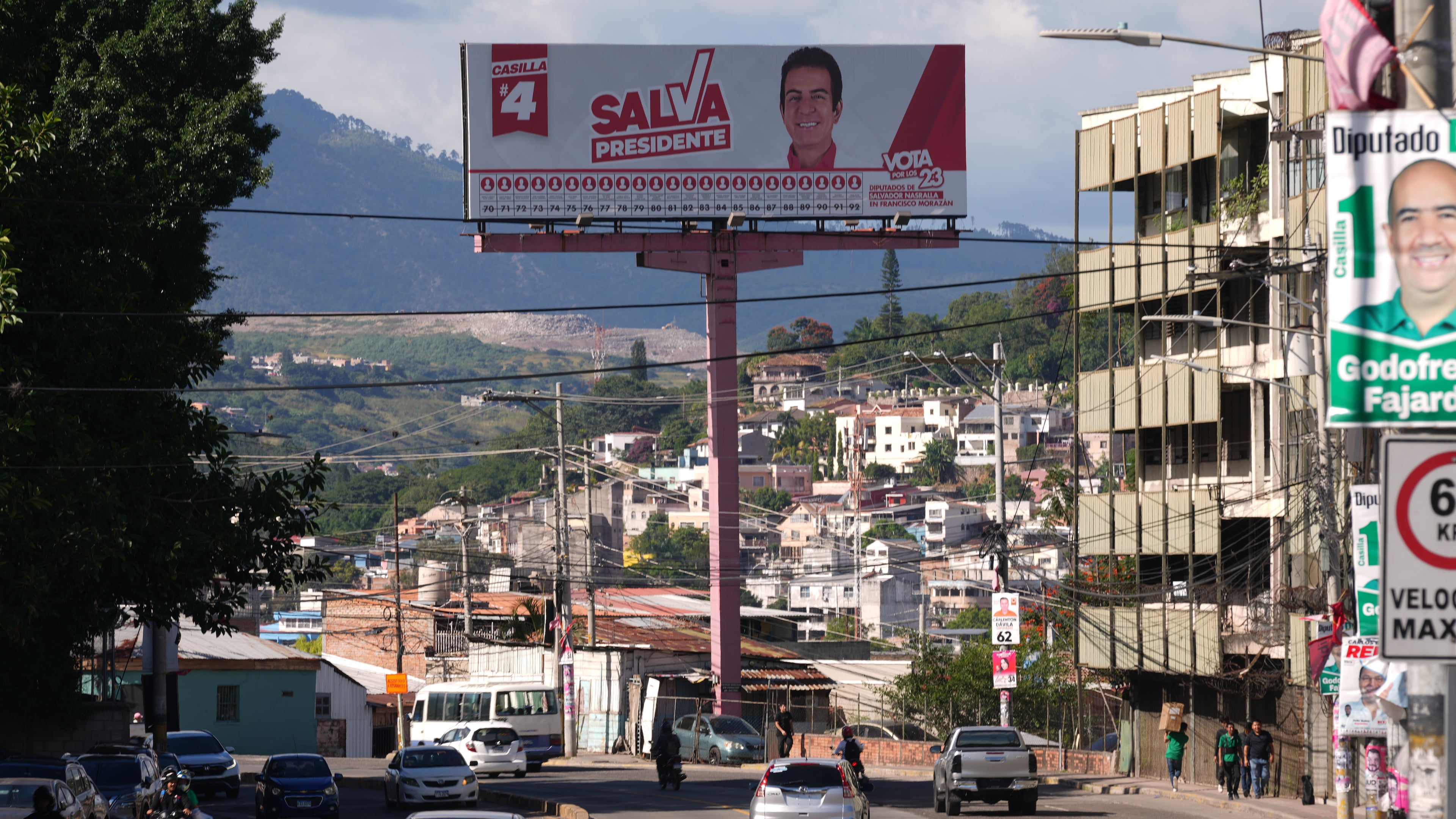 A billboard promoting presidential candidate Salvador Nasralla of the Liberal Party stands in Tegucigalpa, Honduras, Thursday, Nov. 27, 2025, prior to general elections. (AP Photo/Moises Castillo)