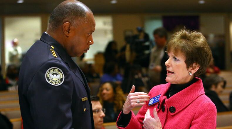 Atlanta City Councilwoman Mary Norwood, right, speaks with retiring Atlanta Police Chief Georgia Turner in this 2014 file photo. CURTIS COMPTON / CCOMPTON@AJC.COM