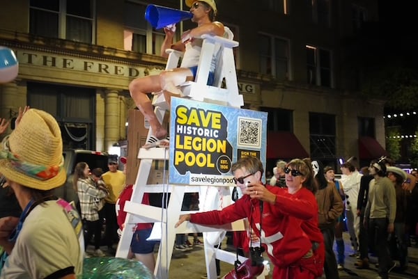 Legion Pool supporters attend the Wild Rumpus Halloween Parade in Athens on Saturday, Oct. 25, 2025. Since the announcement, the effort to save the pool has launched again. (Courtesy of Rinne Allen)