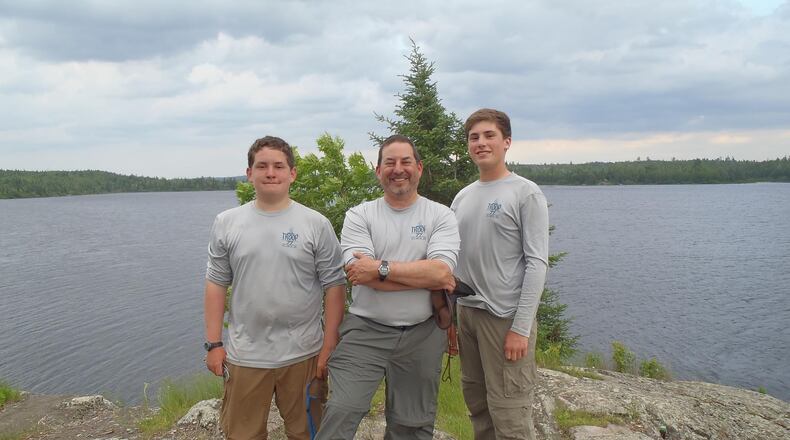 Scouting leader Mitch Leff with his sons Harry and Jack. They've all been active in a Decatur Boy Scout troop for years. Family photo